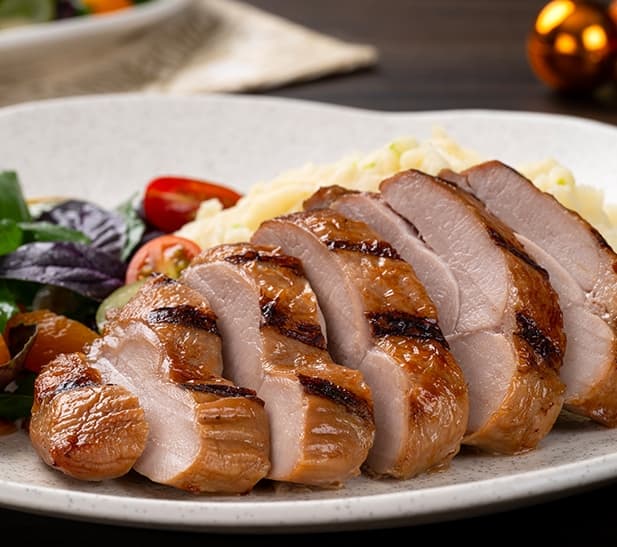 Muslo parrillero de pavo con salsa de miel y romero