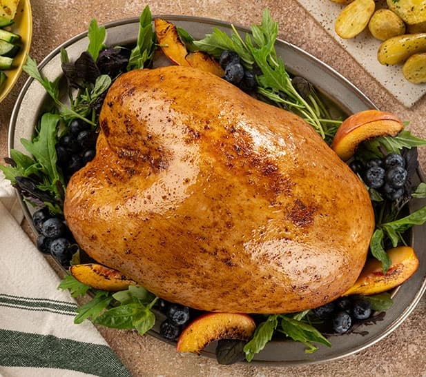 Pechuga de pavo al horno con salsa de manzana y papas al rom...