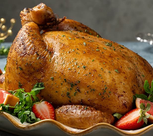 Pollo navideño con salsa de piña especiada y arroz verde con...