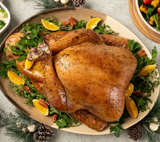 Pavo con gravy y gratín de palmitos con brócoli